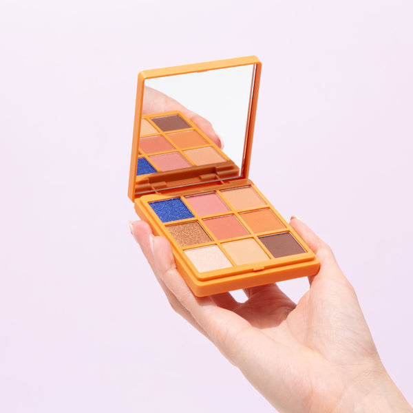 hand holding Blue Eyes Eyeshadow Palette