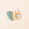 gua sha stone and oil