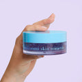 hand holding an Anti-Ageing Repair Gel Booster Mask